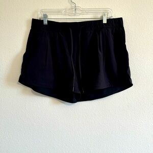 Lululemon. Black drawstring pleated shorts. Size 12